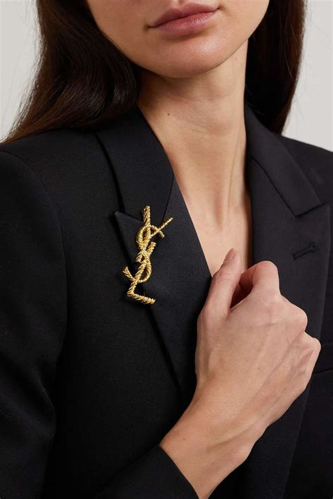 ysl брошь|YSL brooches.